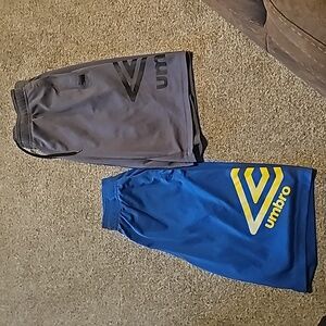 2 pairs of umbro shorts-Size 12/14